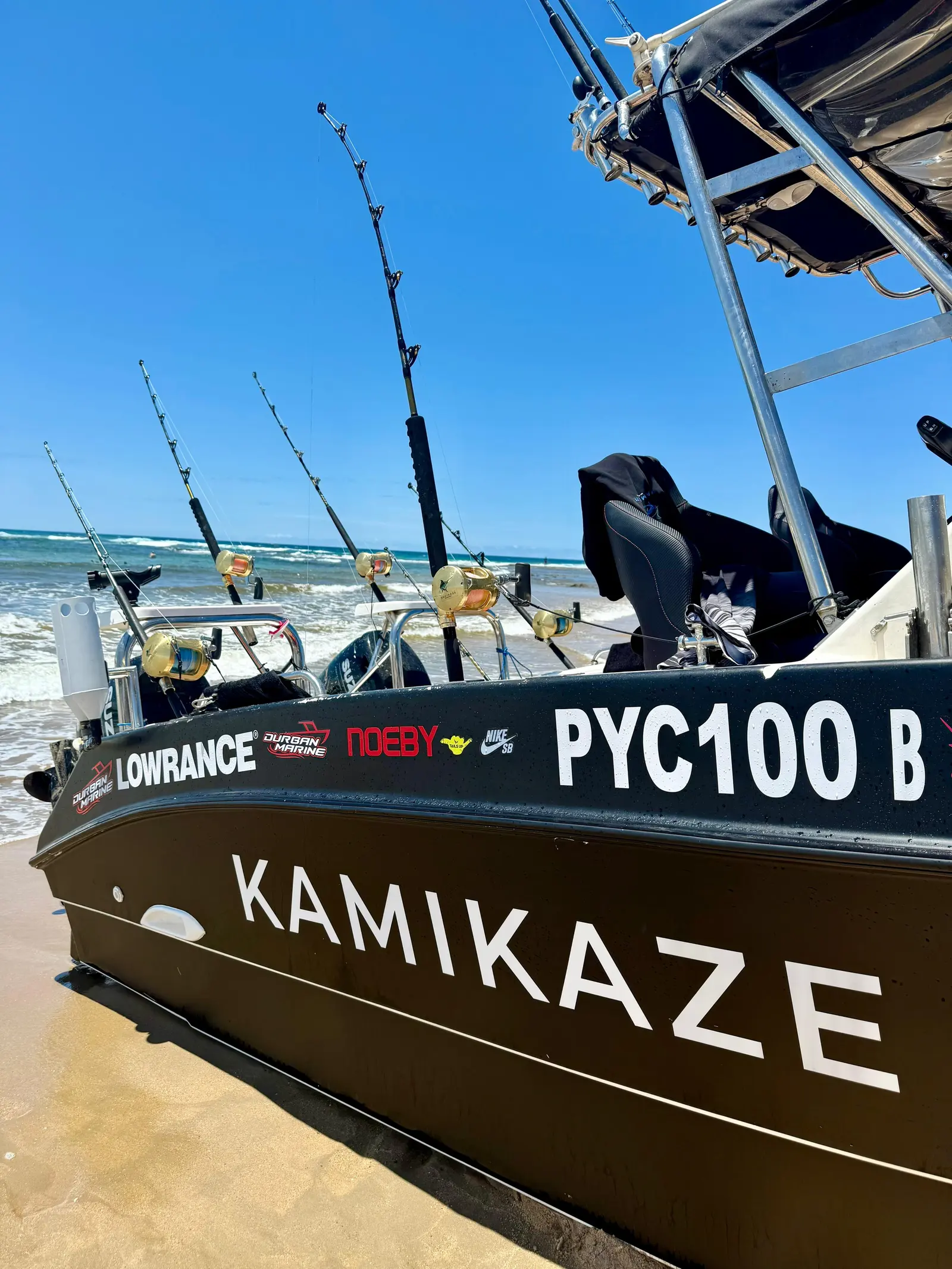 Kamikaze on the beach, sponsor decals on the hull